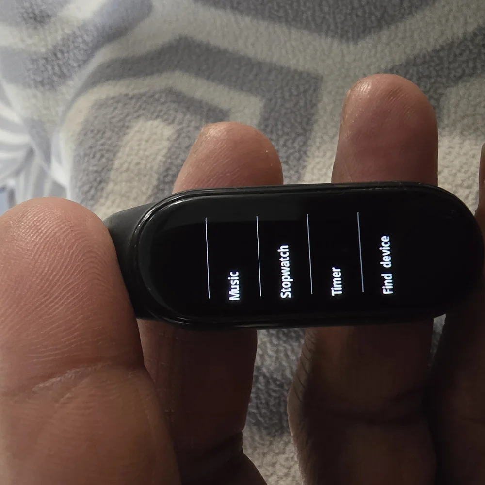 Smart Fitness Tracker with Black Band W/Charge Cable.
